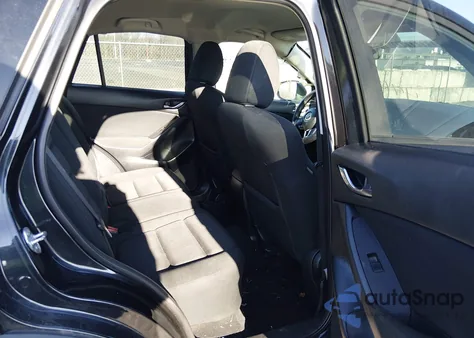 2013 Mazda Cx-5 Touring z USA, uszkodzony, nr VIN JM3KE2CE1D0145977